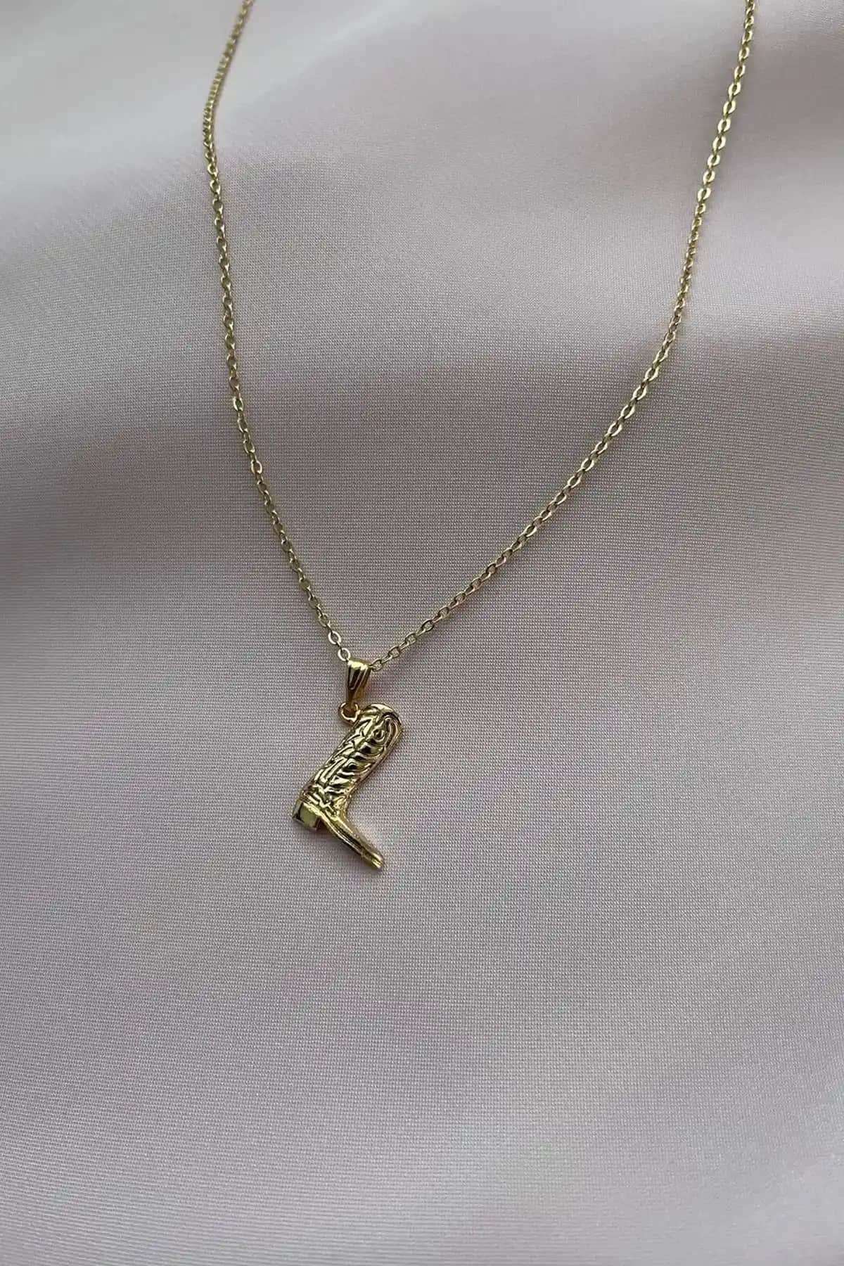 Alexis Carrel Kadın Kolye Karşılaştırması: Gold Kovboy Çizme ve Kırmızı Mineli Model