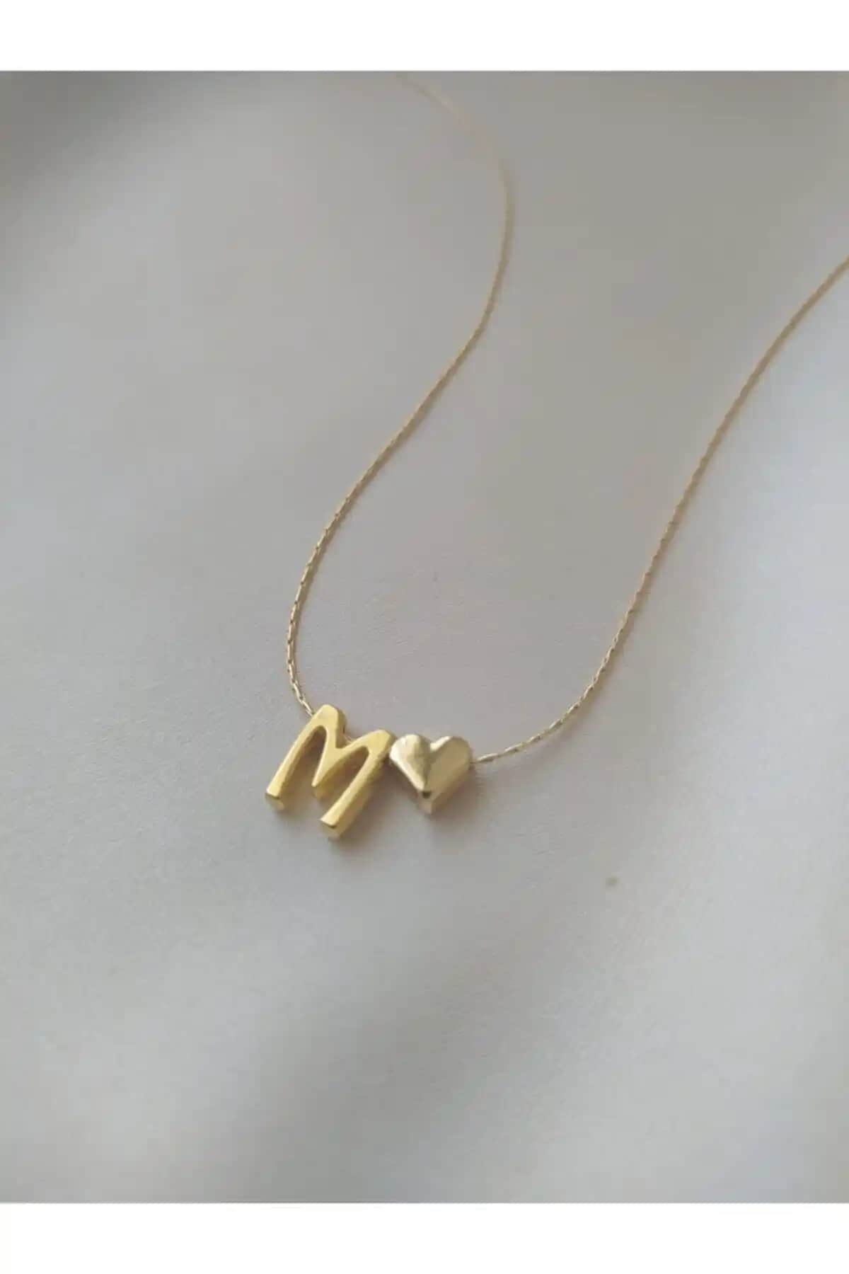 Asia by Leuvoié M Harfli ve Asia Chic Incili Deniz Kabuğu Kolye Karşılaştırması