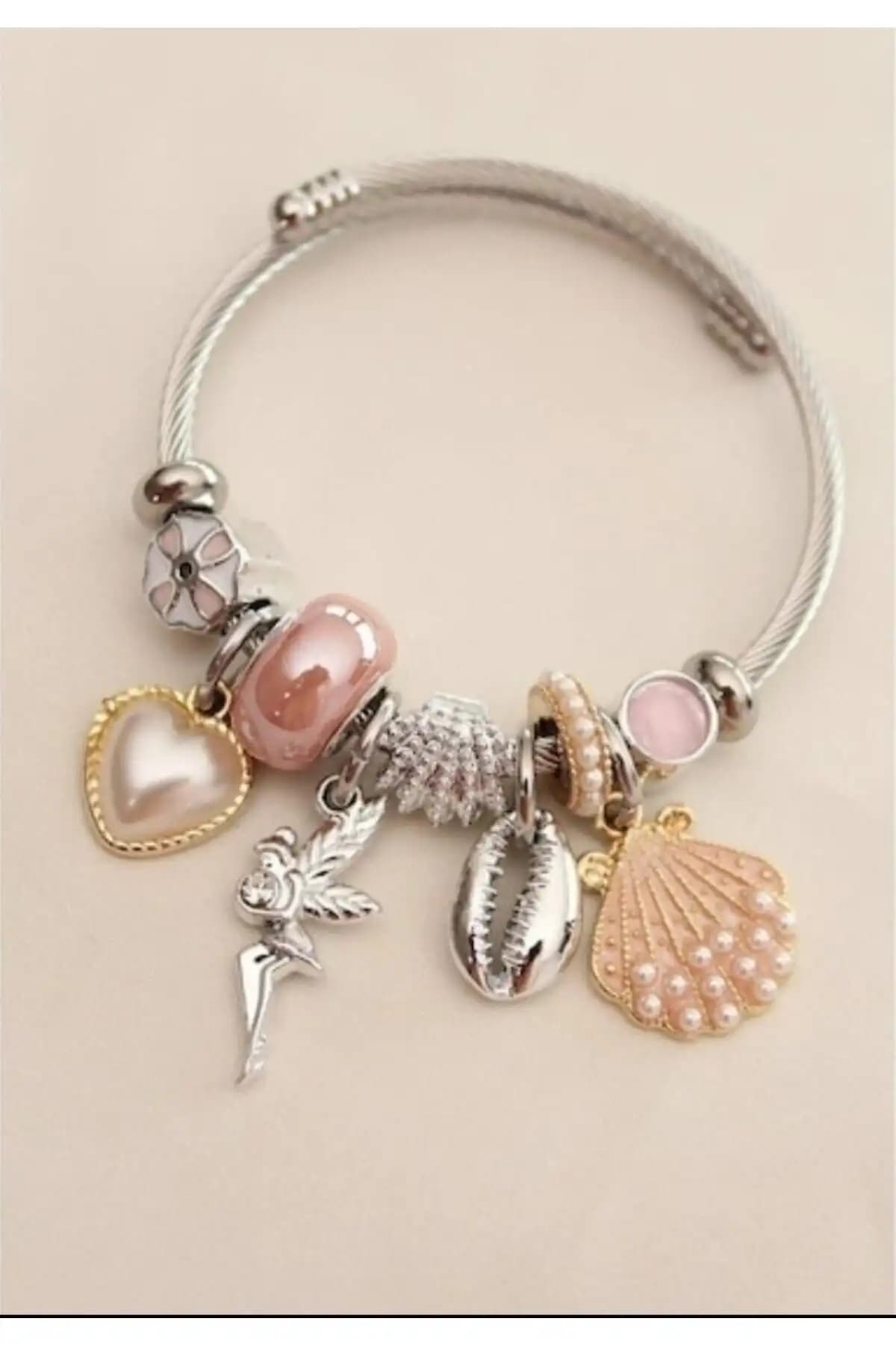 Aurora Jewelry ve Simay Aksesuar Deniz Kabuklu Çelik Bileklikleri Karşılaştırması 2
