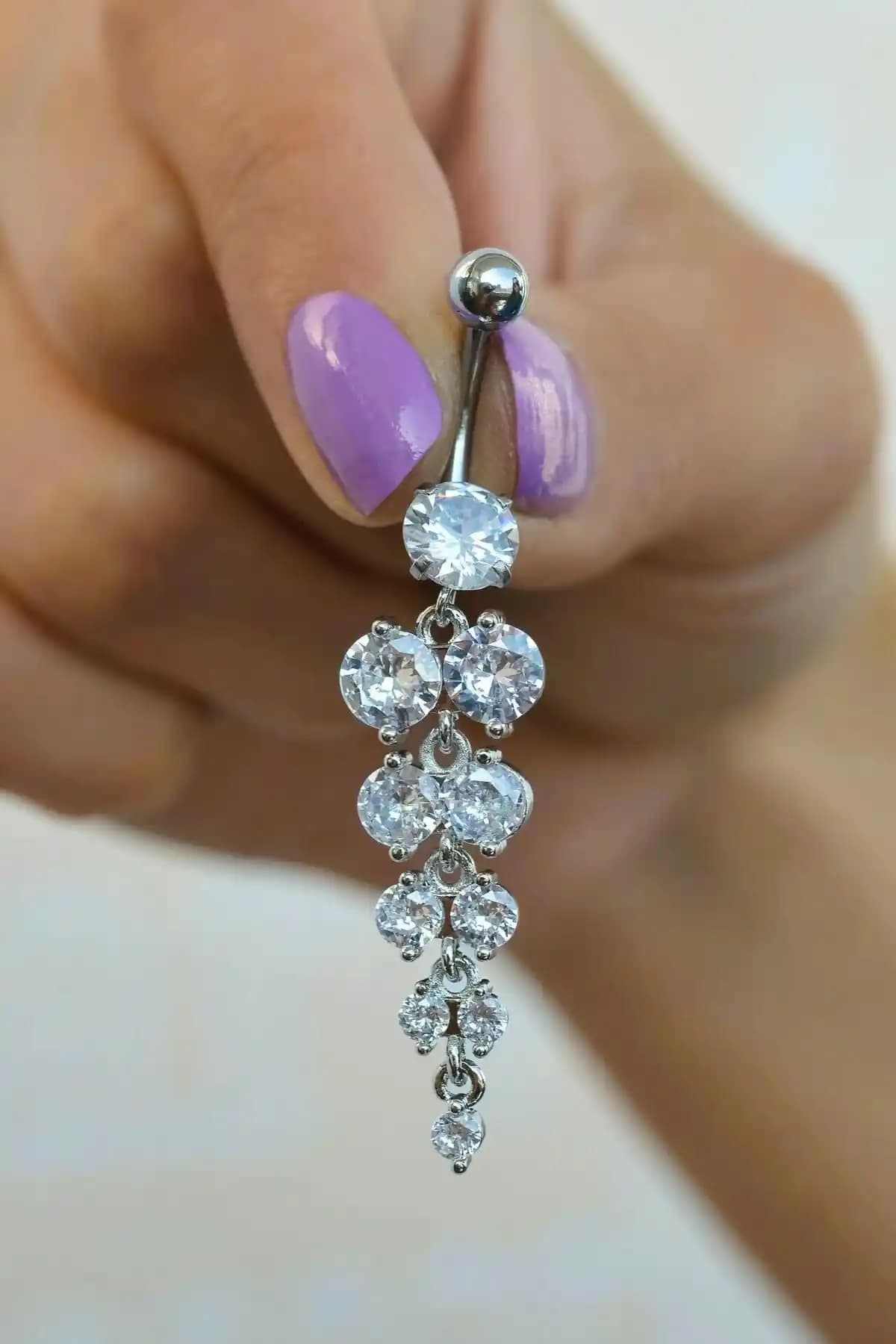 Çelik Su Yolu Işık Seli Sallantılı Göbek Piercingi Güç Renkli Özellikleri ve Kullanım İpuçları