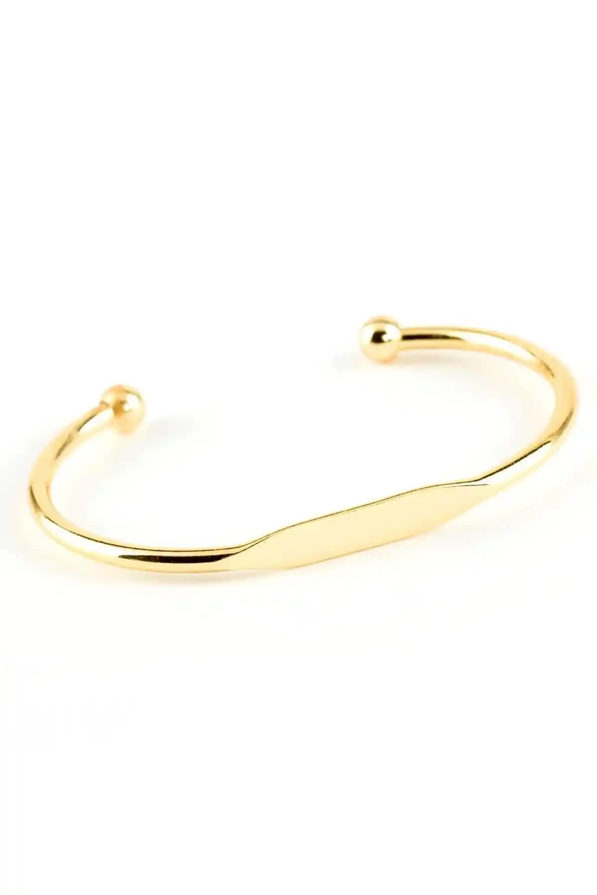 X-Lady Accessories Altın Renk Baskısız Bileklik Kelepçe Şıklık ve Dayanıklılık Sunar