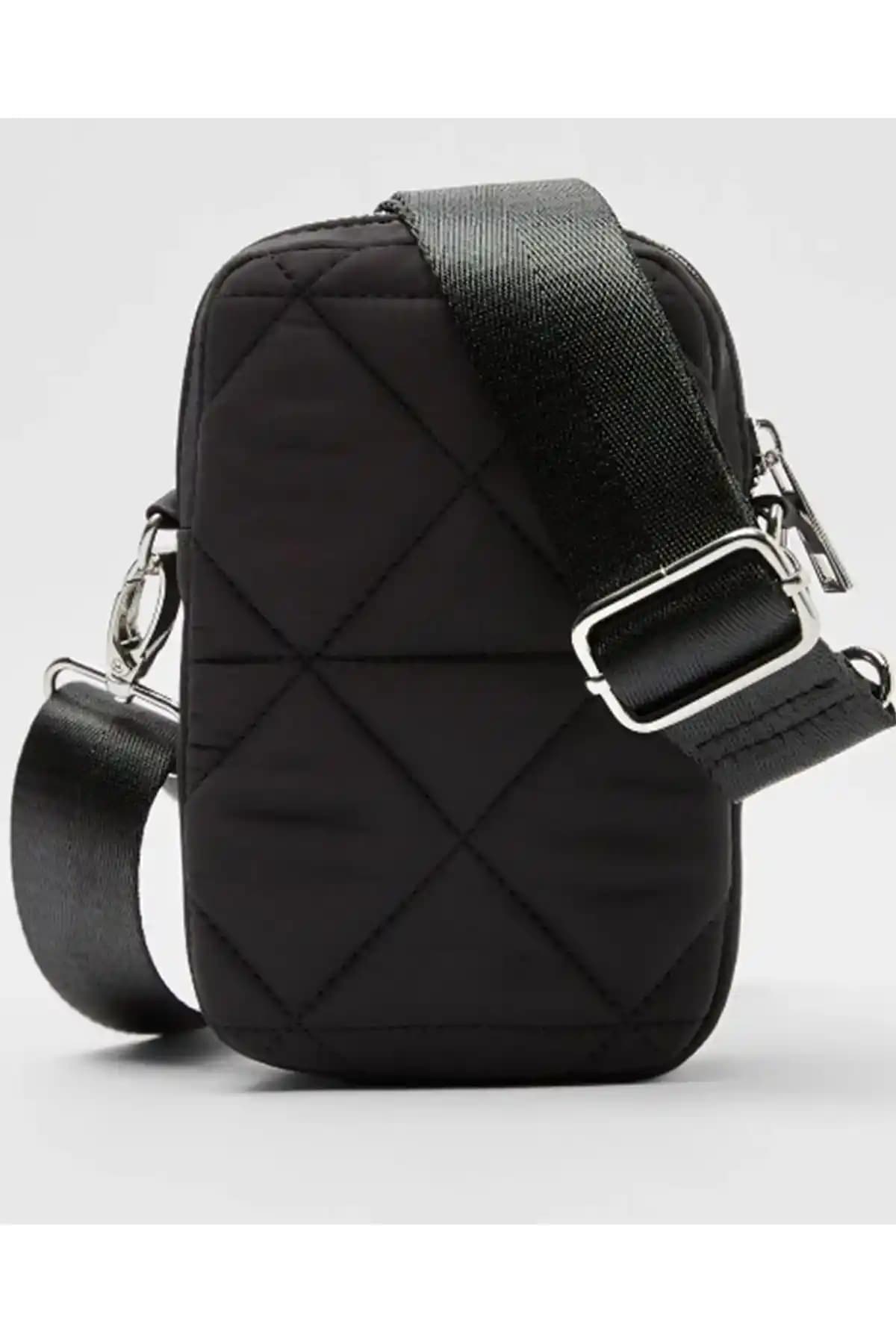 DysCase Kapitone Telefon Çantası ve Everglow Jewelry Taba Çanta Karşılaştırması