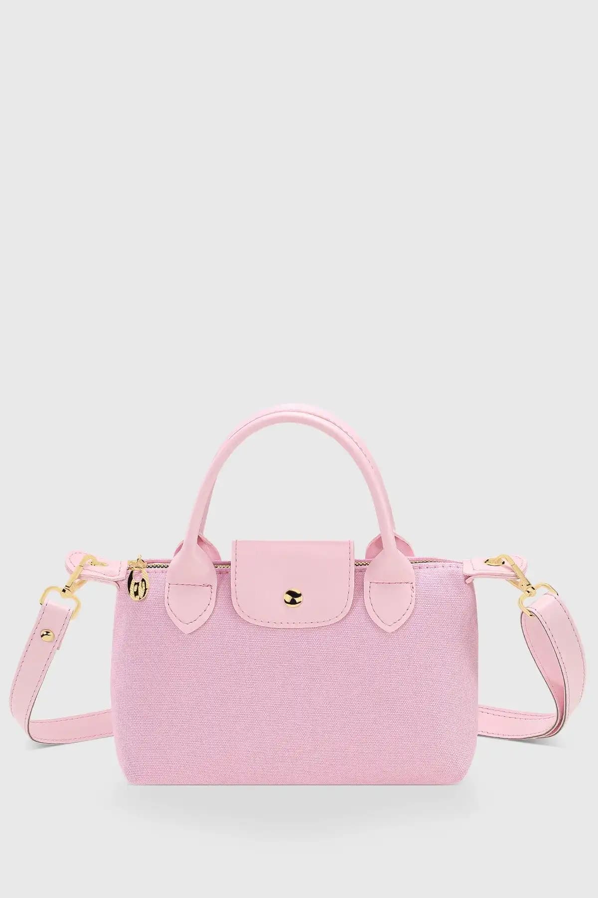 Housebags Pembe Kanvas ve Modstore Kadın Çantası Karşılaştırması: Özellikler ve Kullanıcı Yorumları 1