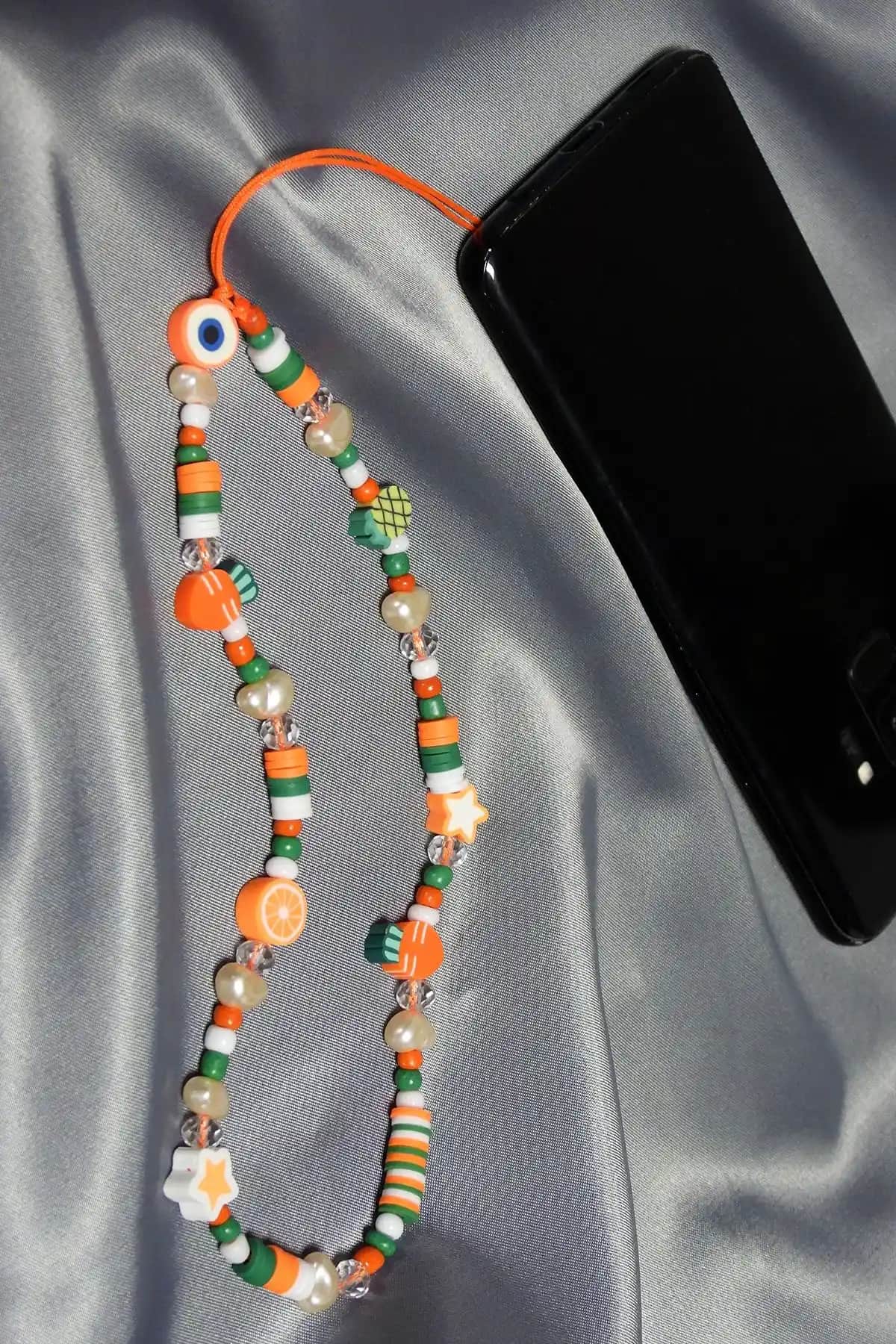 Karlay Turuncu Renkli Boncuk Silikon Telefon İpi ile Şık ve Pratik Koruma Çözümü