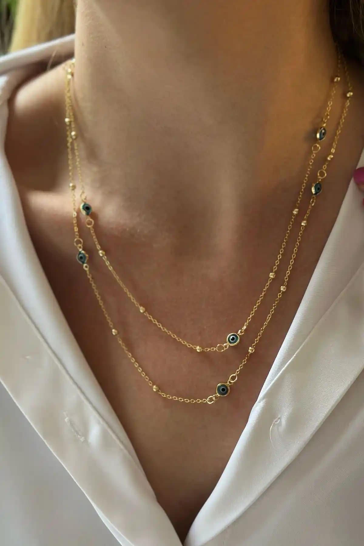 Trendy Butik Dolamalı Nazar Kolye: Şıklık ve Koruma Bir Arada