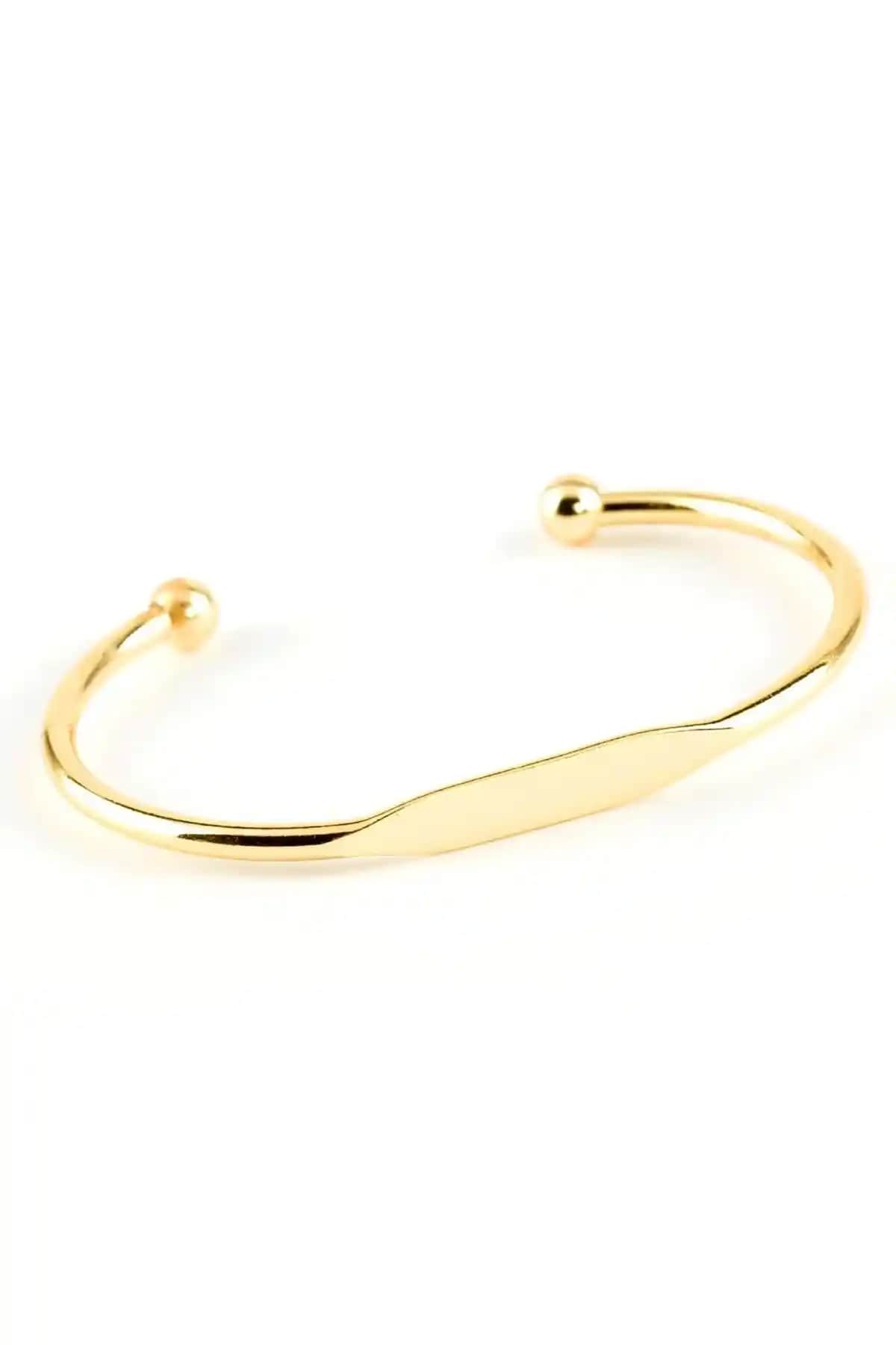 X-Lady Accessories Altın Renk Baskısız Bileklik Modern ve Zarif Tasarımla Şıklığınızı Tamamlar