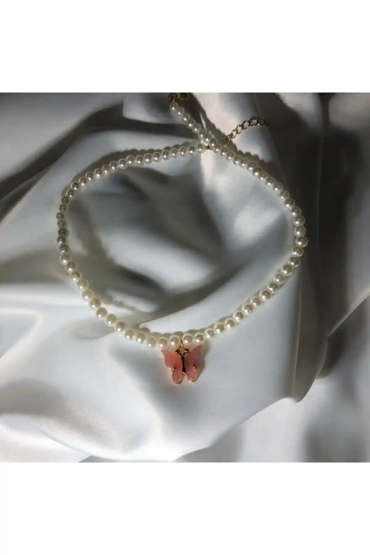 Claritas Takı ve EST Aksesuar Kelebek Kolye Karşılaştırması: Tasarım ve Kalite Analizi