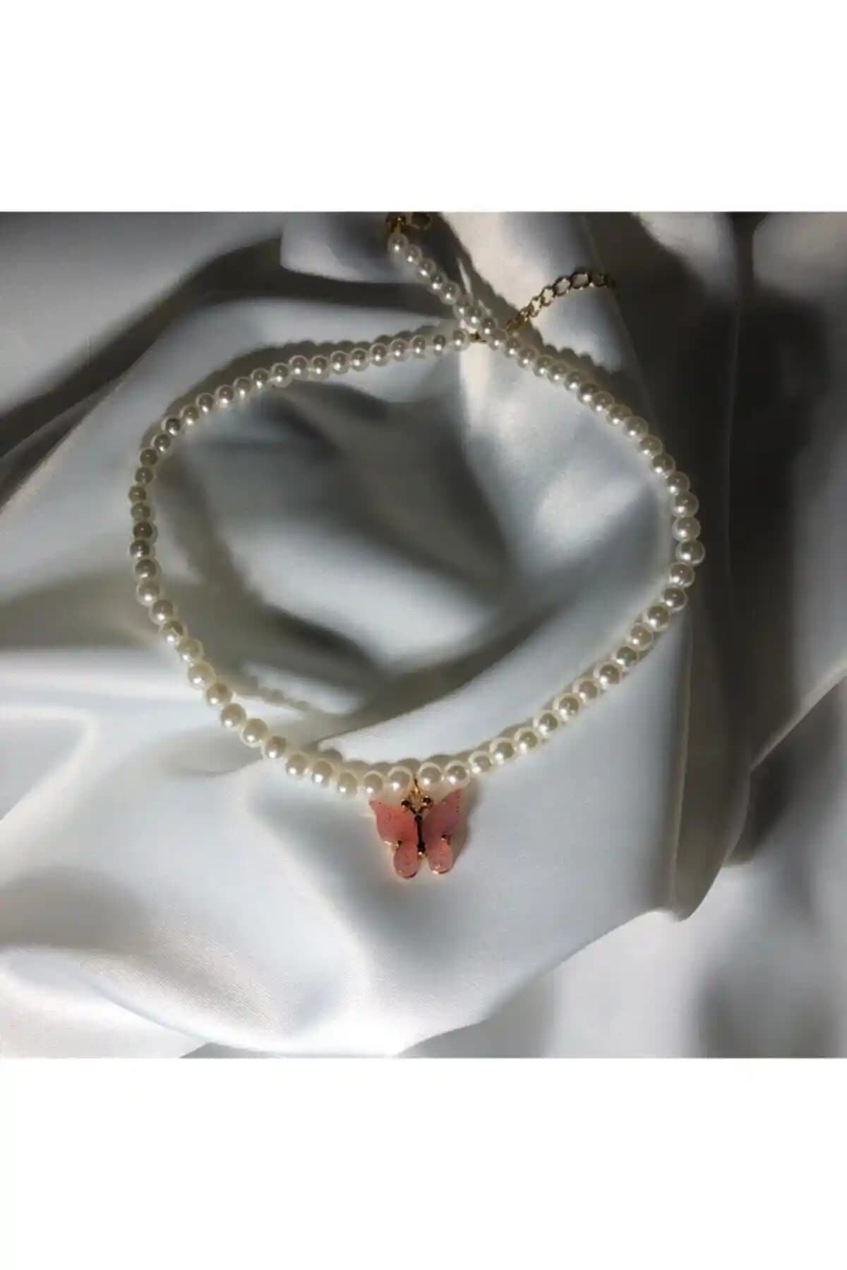 Claritas Takı ve EST Aksesuar Kelebek Kolye Karşılaştırması: Tasarım ve Kalite Analizi