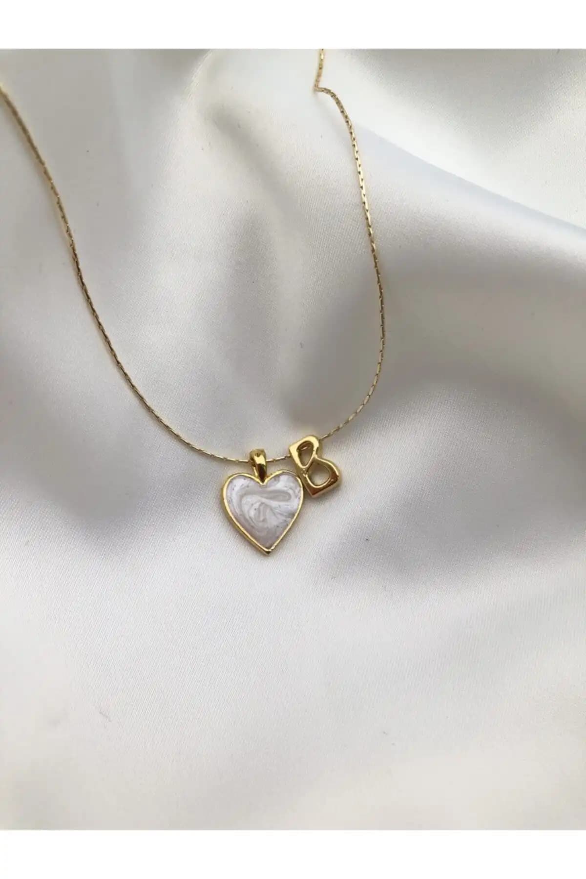 Claritas Takı ve KİLİĞİSTANBUL Minimal Sedefli Gold Kolye Karşılaştırması 1