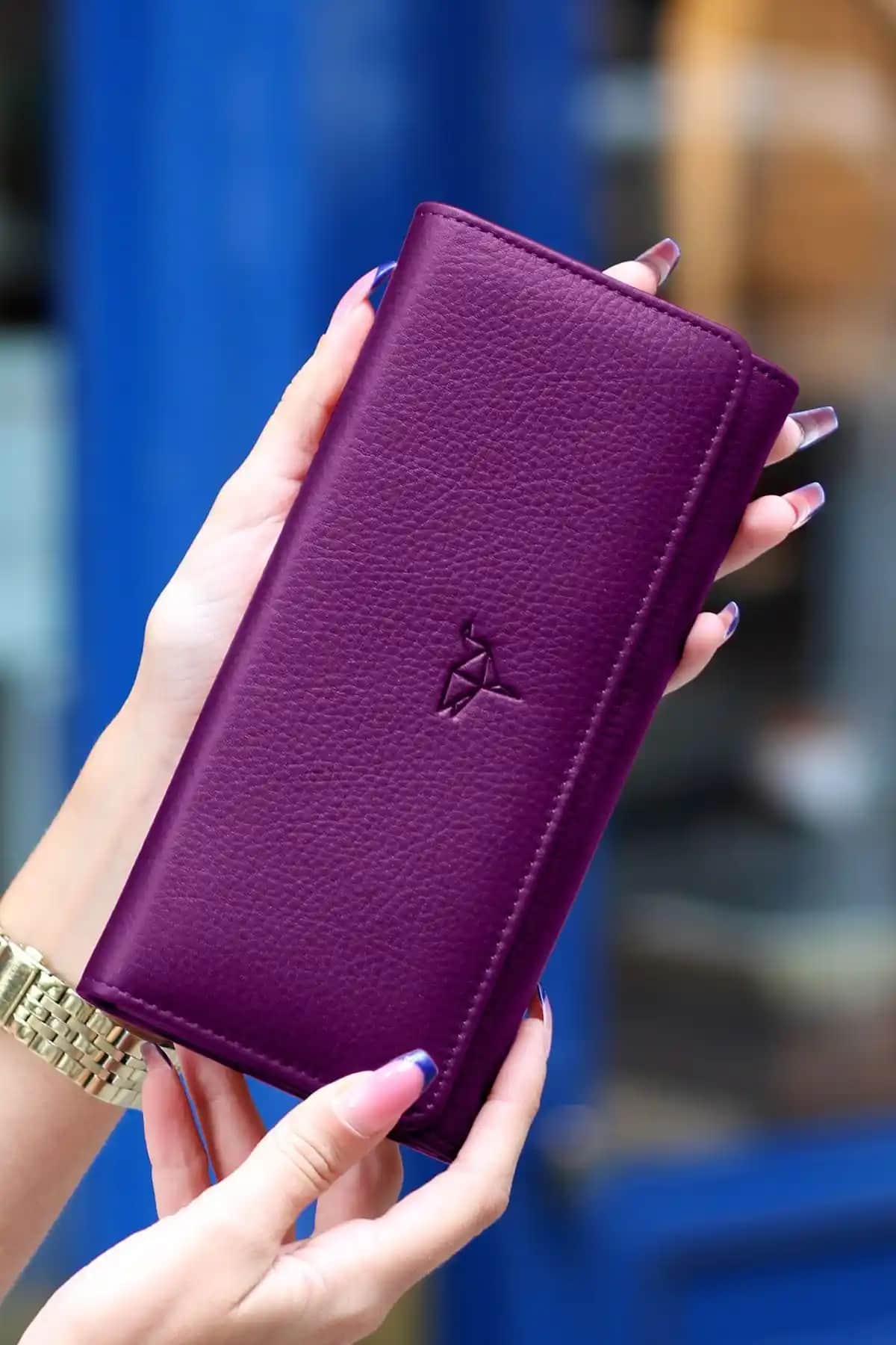 Garbalia ve Laorentou Hakiki Deri Cüzdan Karşılaştırması: Tasarım ve Fonksiyonellik Analizi