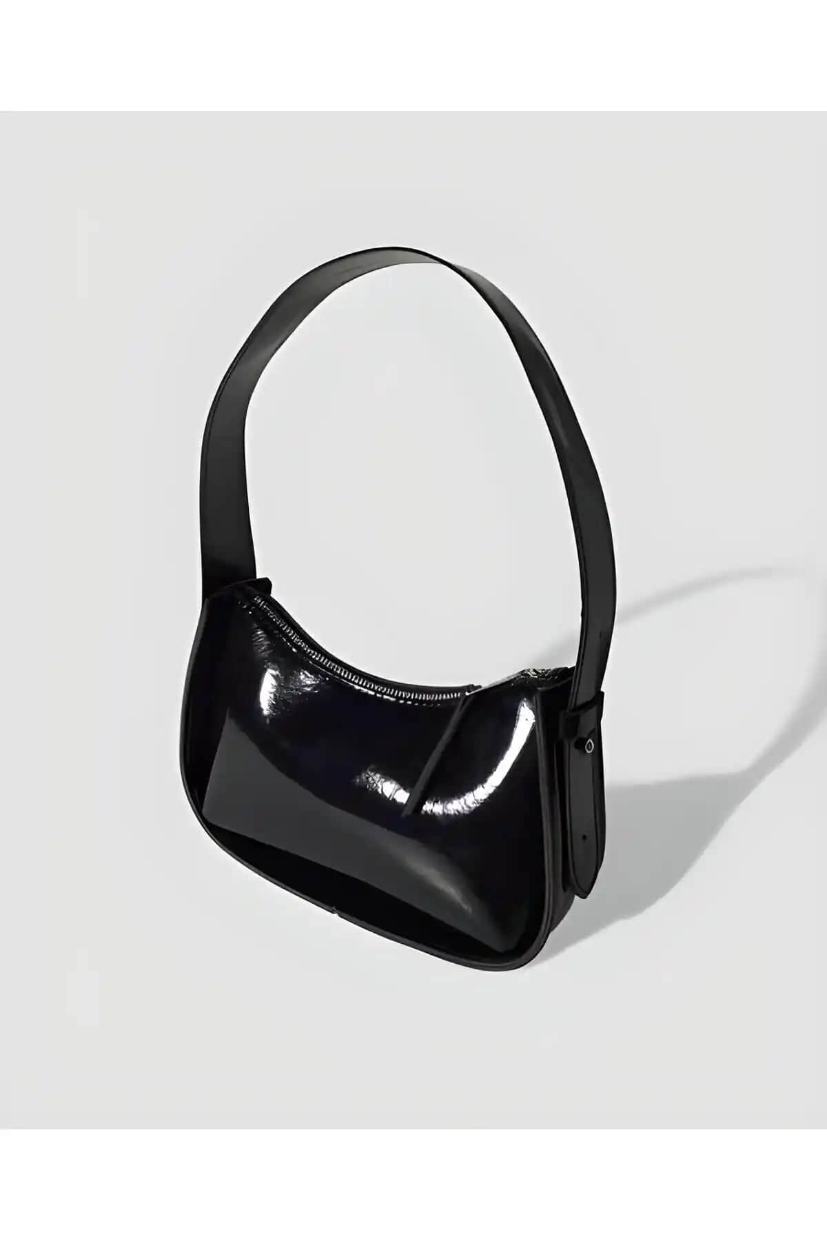 Genel Markalar Siyah Rugan Baget El Çantası ve Kontes Kadın Çıt Çıt Kapamalı Çanta Karşılaştırması