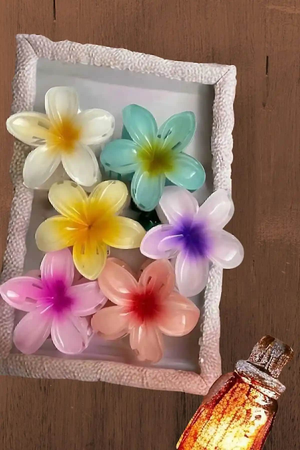 JACK TAMOS ve minibuki Lotus Çiçek Mandal Toka Karşılaştırması: Hangi Model Daha Uygun