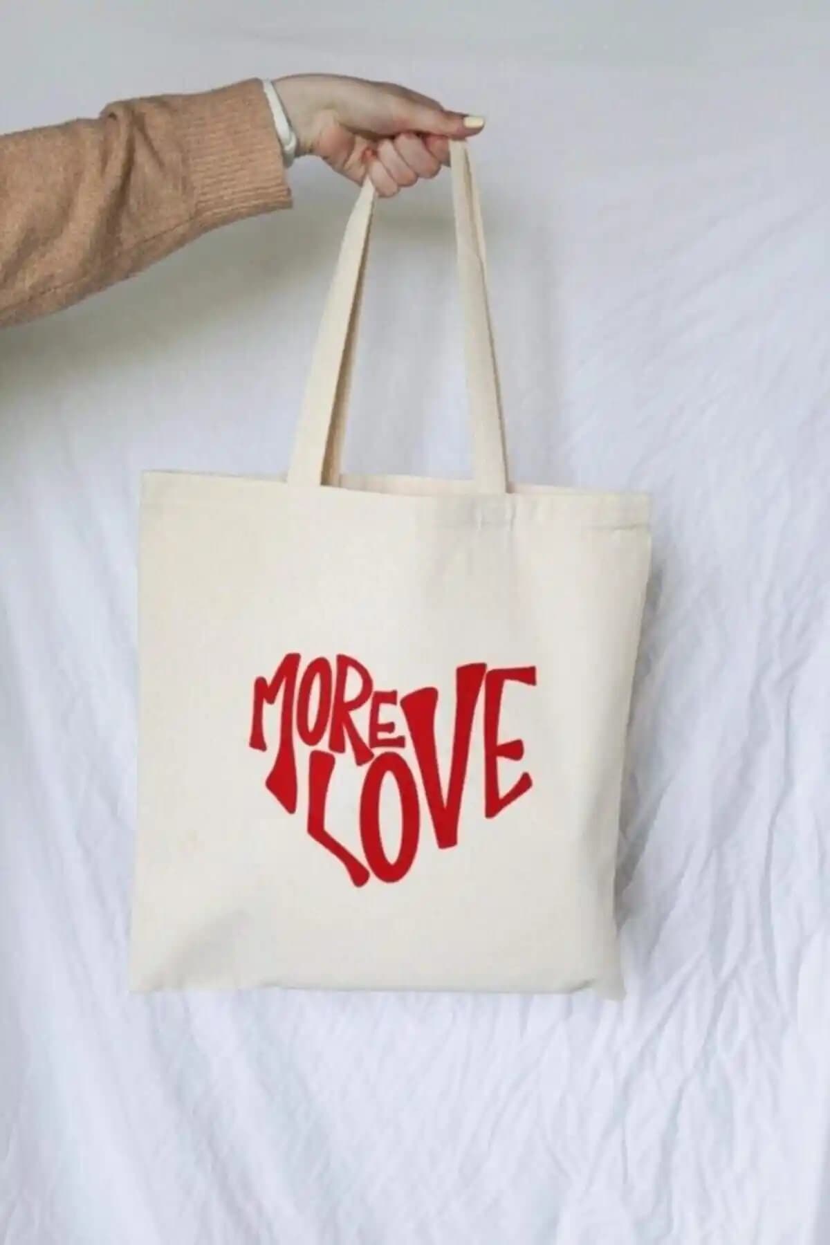 Juzk Solutions More Love ve Manuka Baskılı Kanvas Çanta Karşılaştırması