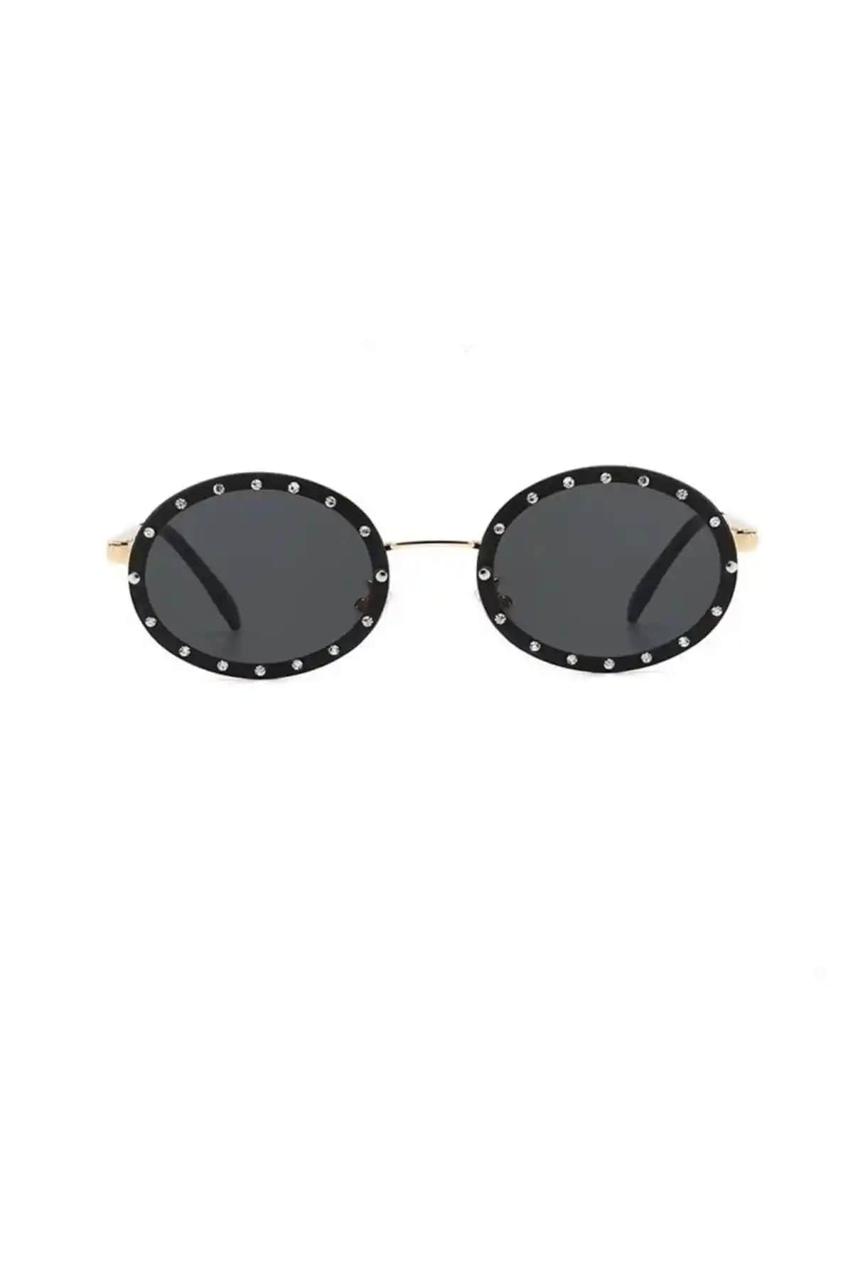 Kapin'in Tasarladığı Oval Siyah Güneş Gözlüğü Modern ve Zarif Tasarımıyla Göz Koruma Sağlar