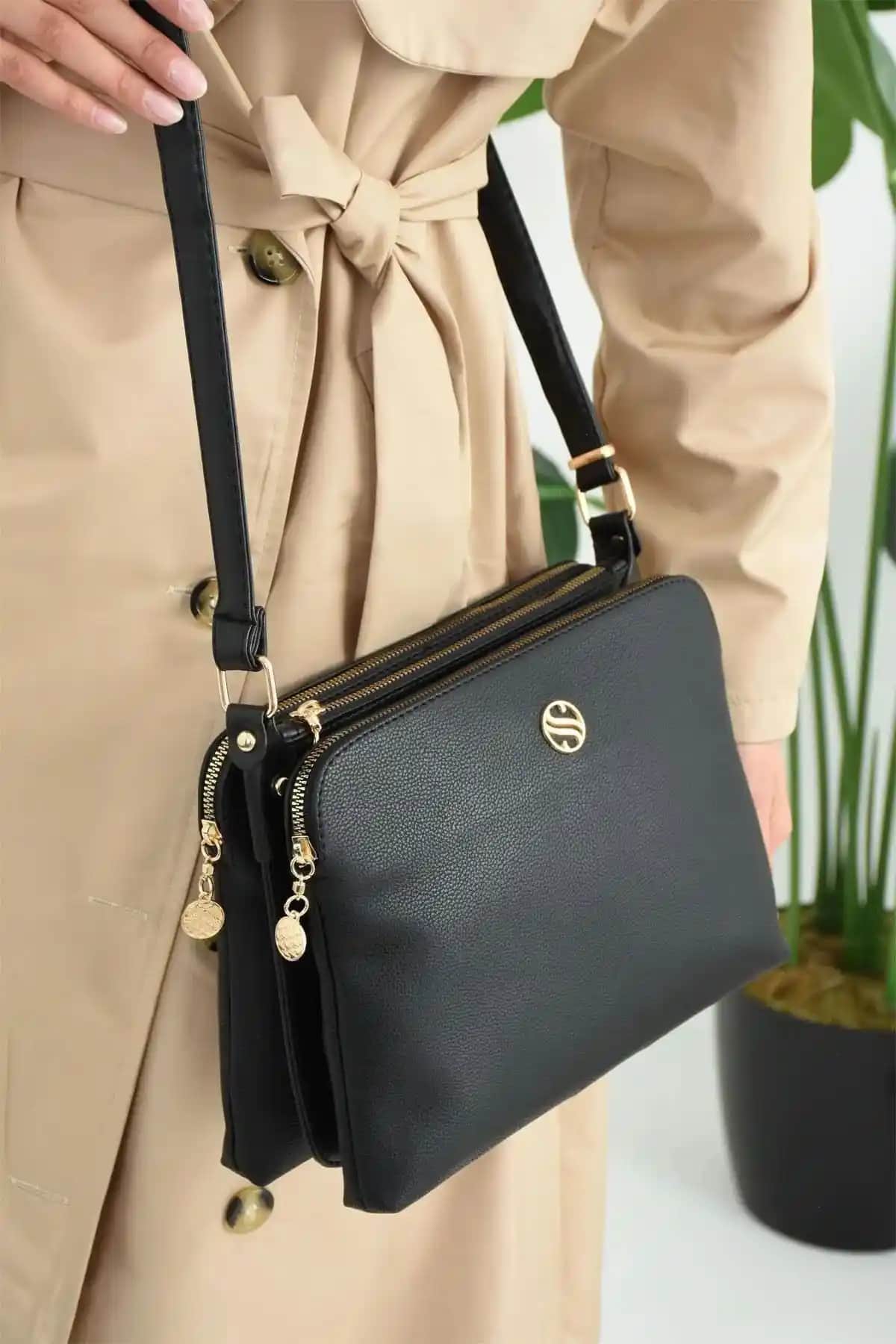 Lifonbag Siyah Yuvarlak Kan Deri Çanta: Şık ve Pratik Günlük Moda Seçeneği