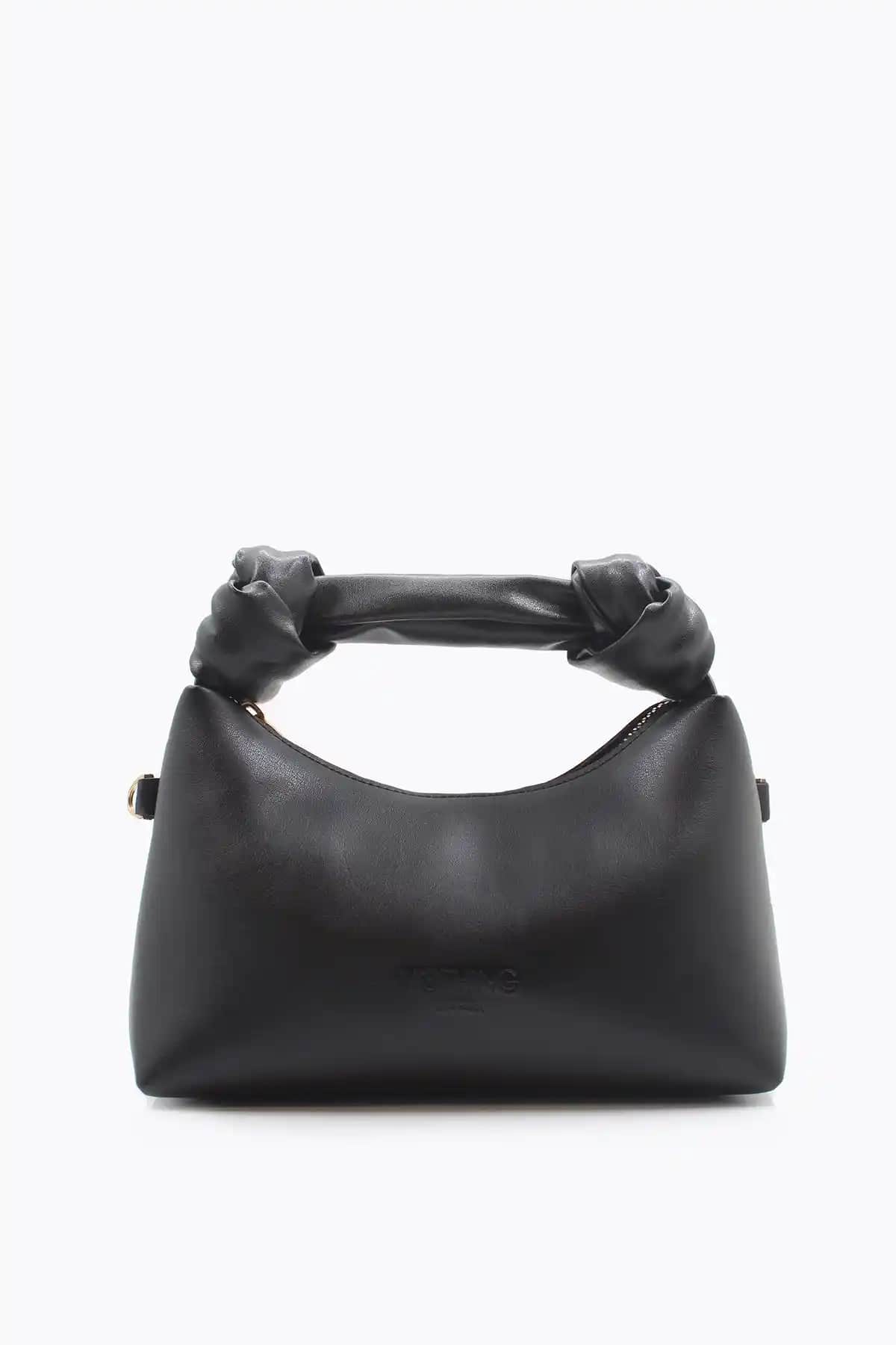 Nothing markasının şık ve dayanıklı siyah mini deri çantası ile tarzınızı tamamlayın