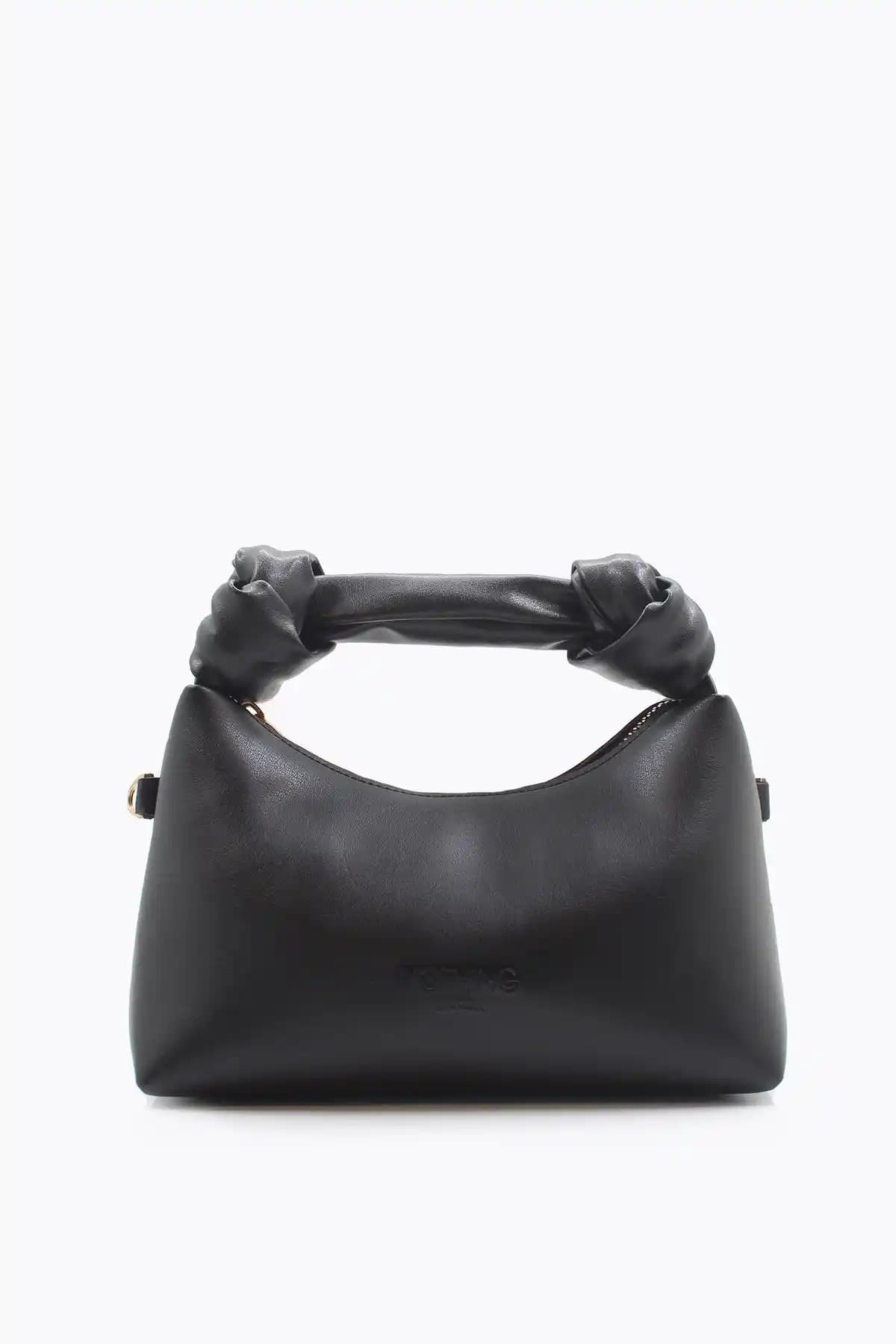 Nothing markasının şık ve dayanıklı siyah mini deri çantası ile tarzınızı tamamlayın