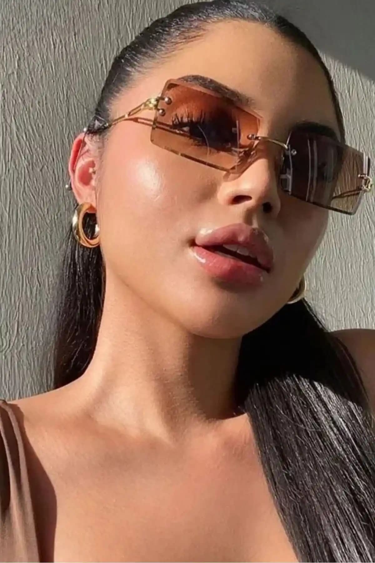 Polo55 Kahverengi Dikdörtgen Güneş Gözlüğü ve Polo55 Mdbjtr2009kahve Karşılaştırması