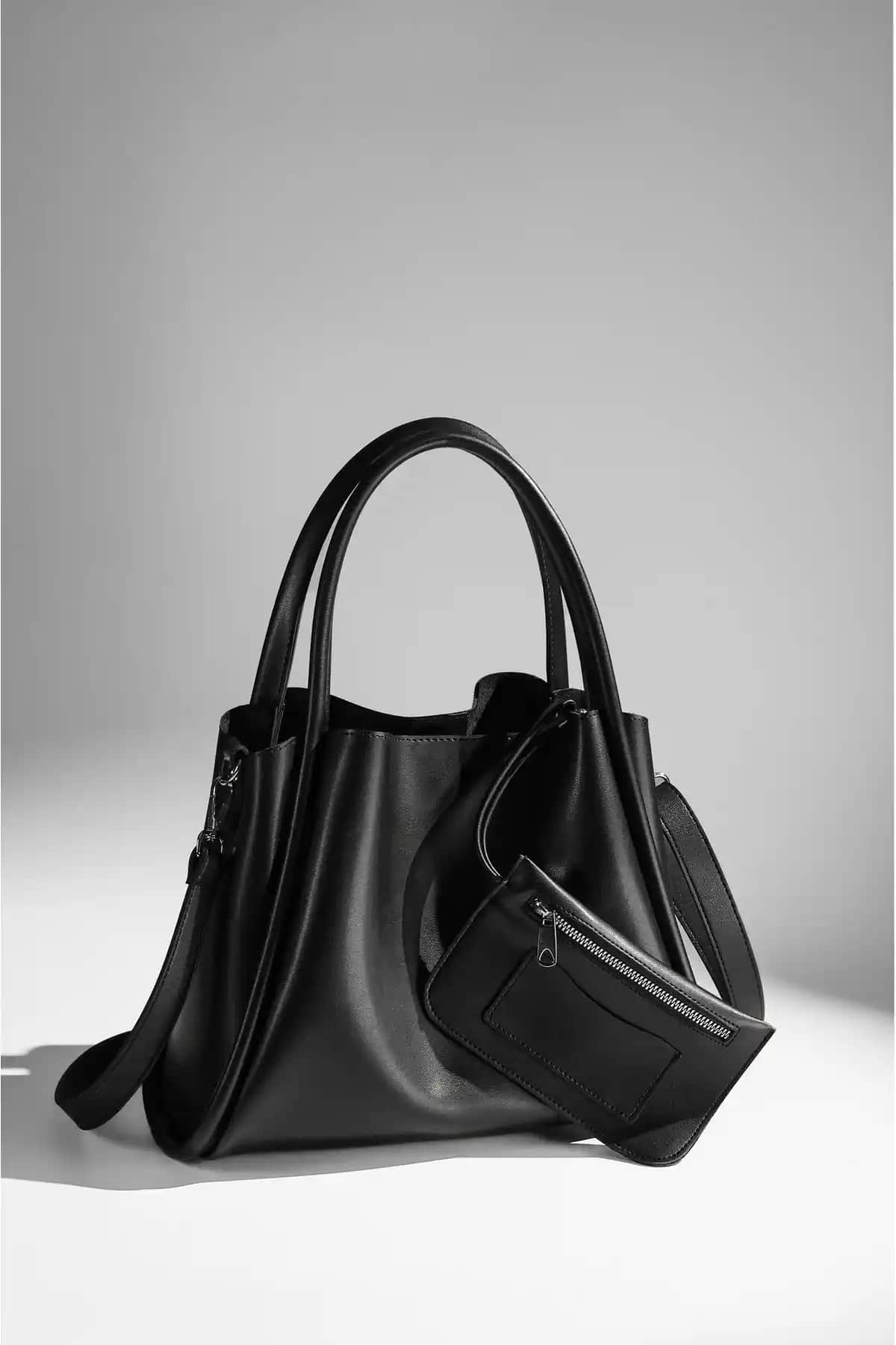 Rimense Kadın Siyah Suni Deri Çanta: Şık ve Fonksiyonel Tasarım Özellikleri