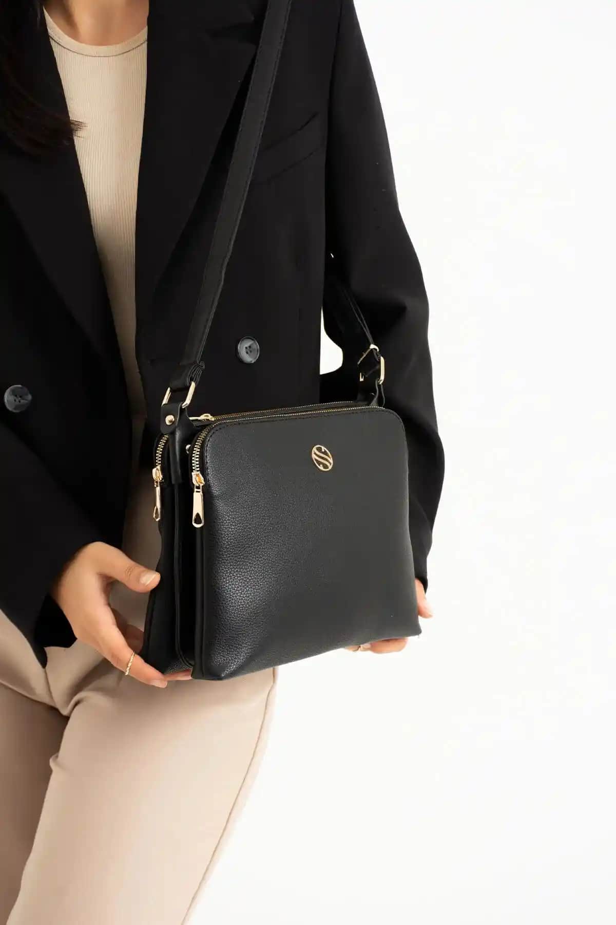 Sanmorris Kadın Suni Deri Çantası: Şık ve Fonksiyonel Günlük Kullanım İçin