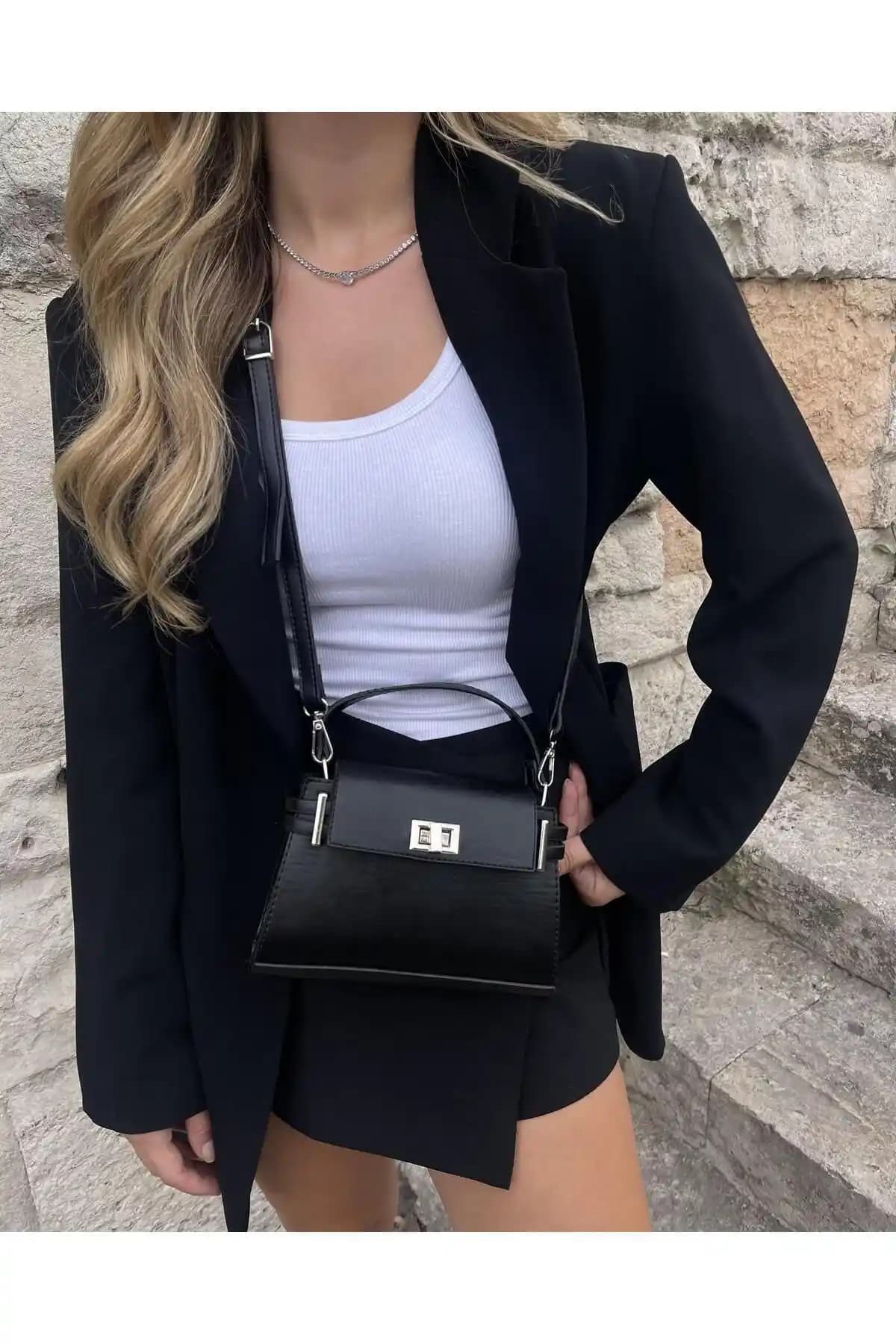 Tina Kilit Kapaklı Siyah Kol Çantası Günlük Şıklık ve Fonksiyonellik Sunar