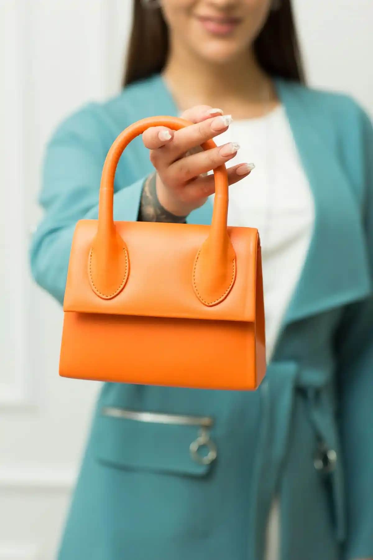 Weem Bag Kadın Turuncu Portföy Çanta: Şıklık ve Fonksiyonellik Bir Arada